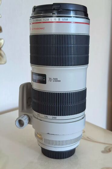 canon 90d: Canon 70-200 f2.8 2ci versiya 
Blendasi yoxdur (dashima cantasi var)