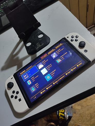 Nintendo Switch OLED: Nintendo Switch oled чипованная (прошитая) встроенная память 32гб+64гб — 7