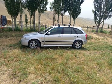 зарядное устройство для электромобиля: Mazda 323: 1999 г., 1.6 л, Механика, Бензин, Седан