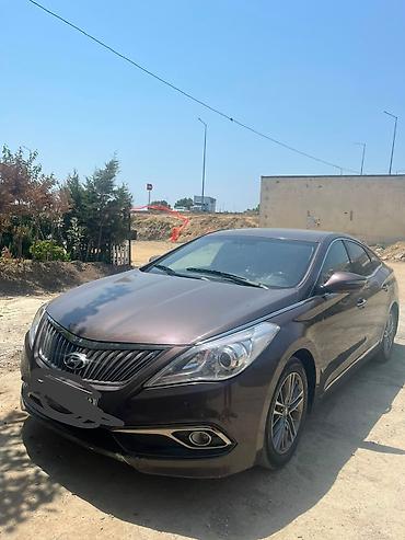 grandeur disk: Hyundai Grandeur: 2 l | 2014 il Sedan — 5