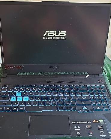Игровой ноутбук **ASUS TUF Gaming A15**. Модель выполнена в фирменном