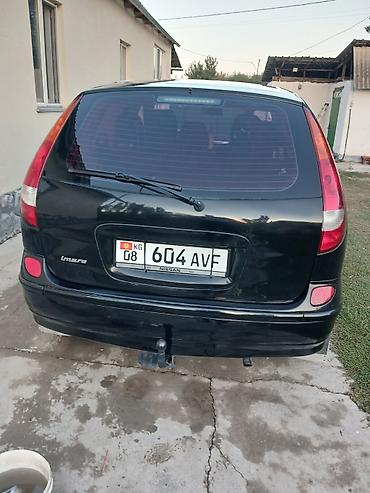 т2 транспортер: Nissan Almera Tino: 2002 г., Минивэн — 2