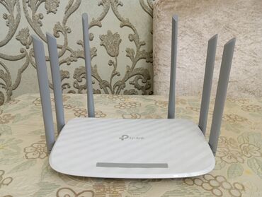 Modemlər və şəbəkə avadanlıqları: Tp-link Archer C86 router.İki diapazonlu Wi-Fi — 2.4 GHz-də 600