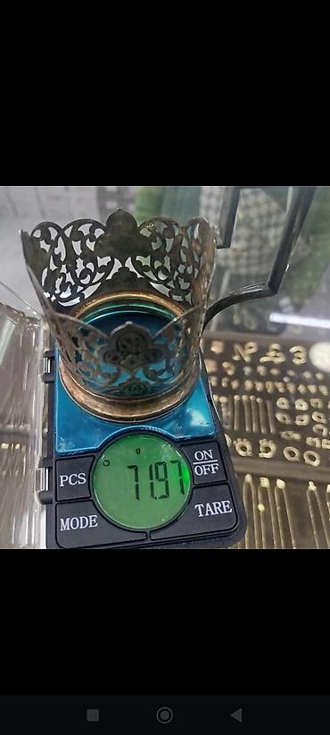 lazerlər: Açıq işli naxışlara malik metal stəkanaltı (podstakanik). - Material — 1