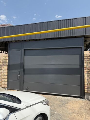 Секционные ворота: – Жогору көтөрүлөт — орун үнөмдөлөт – Кооз жана бекем көрүнүш — — 20