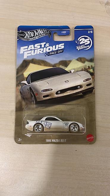 model 1: *İstehsalçı:* Hot wheels *Ölçü:* 1.64 *Vəziyyəti:* 7/10. Qutunun sol — 1