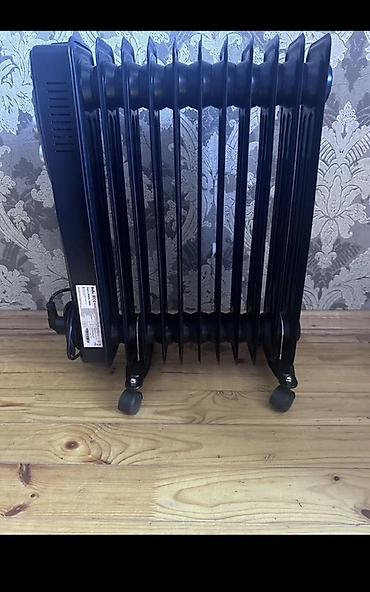 atena yag: Ballu yağlı radiator – elektriklə işləyən, qara rəngli, təkərli model — 3
