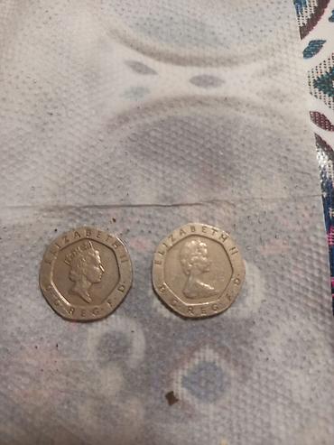 2 qəpik: Məhsul: Böyük Britaniya 50 peniq sikkələri (2 ədəd) Təsvir: - Üz — 1