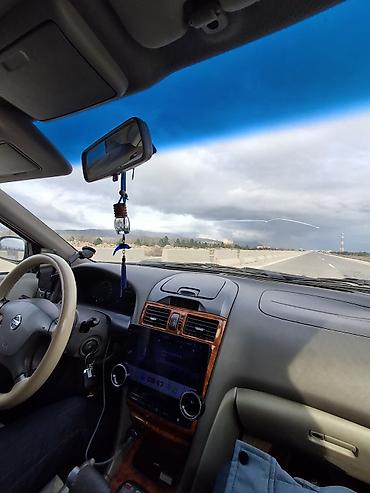 mustan: Nissan Maxima: 3 l | 2006 il Sedan — 6