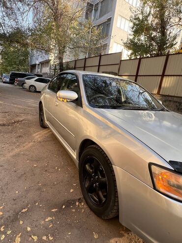 пороги на мазду: Седан среднего класса серебристого цвета. Основные особенности: -