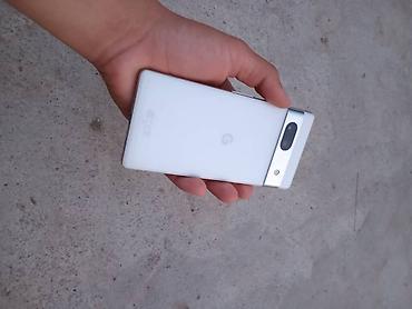 Google: Google Pixel 7a, Б/у, 128 ГБ, цвет - Белый, eSIM, 1 SIM — 1