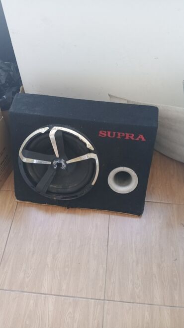 разбитый телефон fly: SUPRA avtomobil subvuferi – portlu (120mbass reflex) korpusda