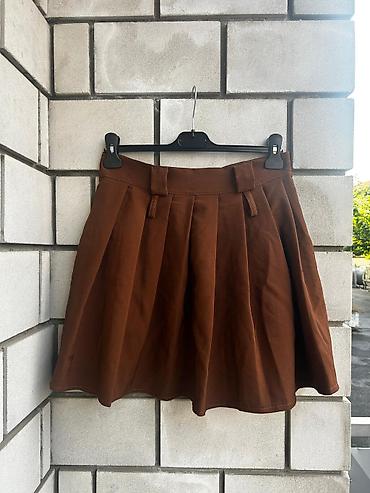 Kompleti: Set ženske odeće – pantalone i tri suknje Plava suknja sorc sa kaisem — 3
