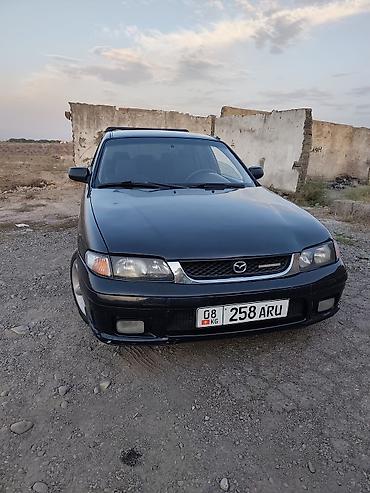 12 t: Mazda 626: 1997 г., 1.8 л, Механика, Бензин, Седан — 1
