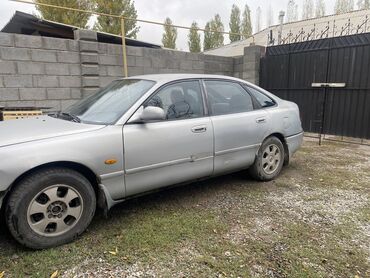 узген машина: Mazda Cronos: 1992 г., 2 л, Механика, Бензин, Хетчбек