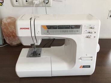 весы наполные: Тигүүчү машина Janome, Электромеханикалык