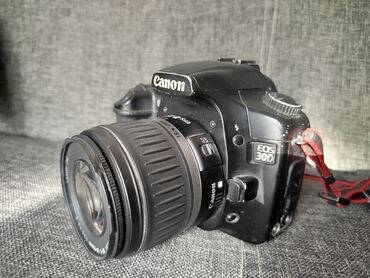 видеокарту ddr 2: Фотоаппарат Canon EOS 30D черного цвета с объективом. Эта цифровая