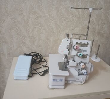 Tikiş maşınları: Tikiş maşını Yeni,Overlok, 4 saplı, Ünvandan götürmə — 8