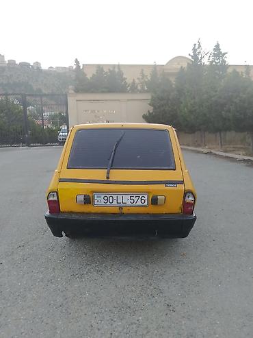 e60 guzgu: Tofaş Toros universal (sarı rəng) Xüsusiyyətlər: - Kuzov: 5 qapılı — 4