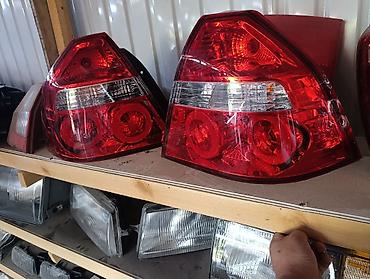 кочкор авто: Задние фонари (левый и правый) для автомобиля Daewoo Nexia 3 — 2