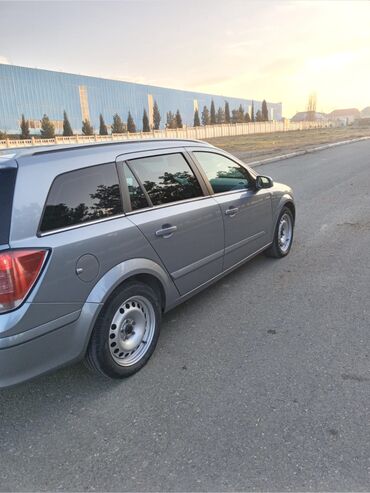 Opel: Opel Astra H Caravan (universal), boz rəng. - Kuzov: 5 qapılı — 3