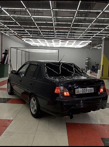 Другие автомобили: Седан черного цвета с доработанным экстерьером. Основные особенности — 2