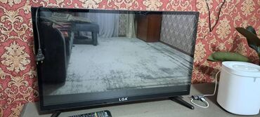 Телевизоры: Телевизор LQA с плоским экраном и черной рамкой. Подходит для