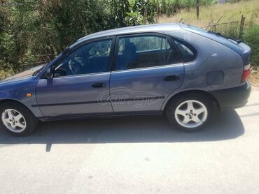 Toyota Corolla: 1.3 l | 1995 year Hatchback