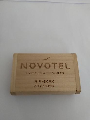 e book: Деревянная USB-флешка Novotel Bishkek City Center с фирменной — 1