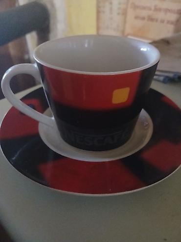 postamenti: Porcelanske šoljice sa tacnom – Nescafé dizajn. - Materijal — 1