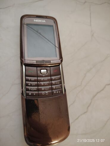 телефон fly era nano 6: Nokia 800C, rəng - Qızılı, Düyməli