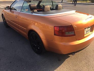 Audi: Audi A4 Cabriolet – kabriolet, fərqli mis-bürünc rəngdə Xarici: - — 4