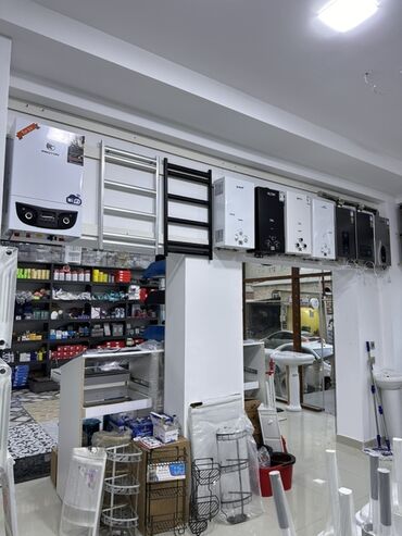 кулер для воды: Protherm markalı divara quraşdırılan su qızdırıcısı. Bu model ağ
