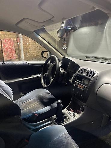 червяк 124: Mazda 323: 1999 г., 1.5 л, Механика, Седан — 4