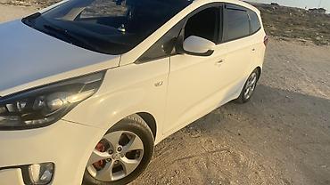 picanto kia: Kia Carens, ağ rəng, 5 qapılı kompakt MPV. Xarici: - LED gündüz — 1