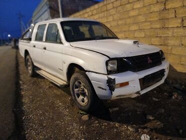 Mitsubishi: Mitsubishi L200 pikap – ikicərgəli kabin, arxa bortlu yük yerinə — 10