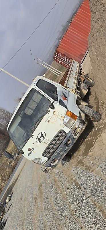 буксир: Hyundai Mighty II — малотоннажный бортовой грузовик. Основные — 1