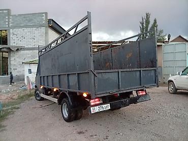 глушитель авто: Грузовой фургон Mercedes-Benz (рамный, задний привод) с бортовой — 2