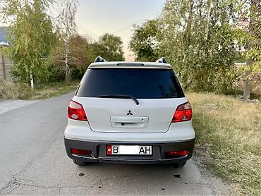 шины 14 радиус 18565: Mitsubishi Airtrek: 2004 г., 2.4 л, Автомат, Газ, Кроссовер — 6