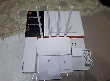 iphoni 11: Xiaomi Mi Router 4C – 300 Mbps Wi‑Fi router Xüsusiyyətlər: - 2.4 GHz — 1