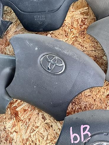 Детали салона: Подушка безопасности (модуль airbag) водительского руля Toyota. - — 1