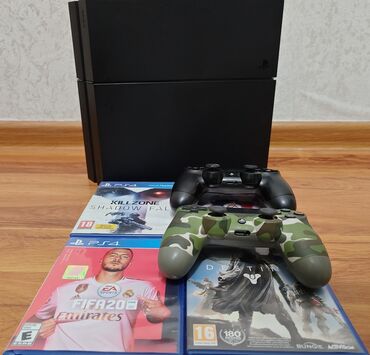 прошитая: Продаю PS4 (500gb) Закаченные игры 8шт. плюс 5 дисков В комплекте 2