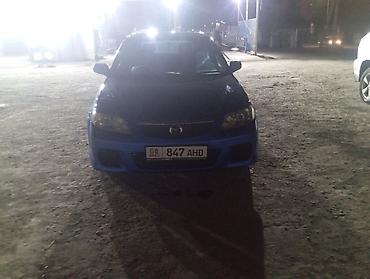авто лейлек: Mazda Familia: 2002 г., 1.5 л, Типтроник, Бензин, Хетчбек — 6