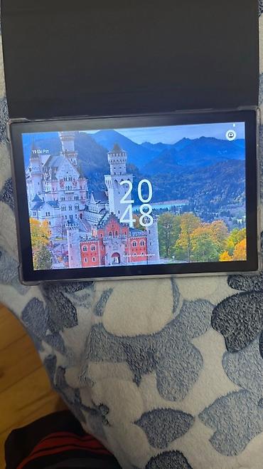 azercell modem wifi: Planşet – Android - Böyük ekranlı Android planşet. Ekranda saat/giriş — 1
