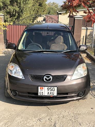 с 500: Mazda Demio: 2005 г., 1.3 л, Автомат, Бензин, Хэтчбэк — 1