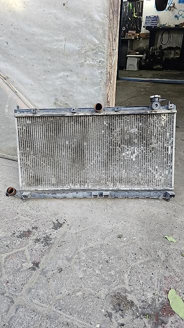 byd taksi: Avtomobil radiyatoru. BYD F3 avtomobili üçün.Deşiyi və yaxud su axıdan — 1