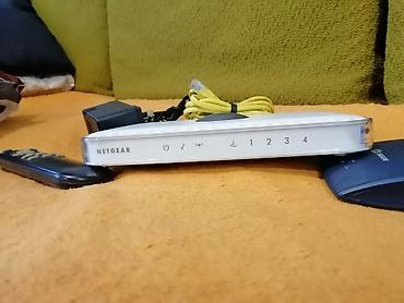 Настольные ПК и комплектующие: NETGEAR 4-portlu şəbəkə marşrutlayıcısı Xüsusiyyətlər: - Ön paneldə — 1