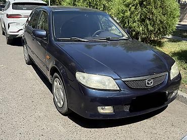 mazda mx5: Mazda 323: 2002 г., 1.6 л, Механика, Бензин, Хэтчбэк — 1