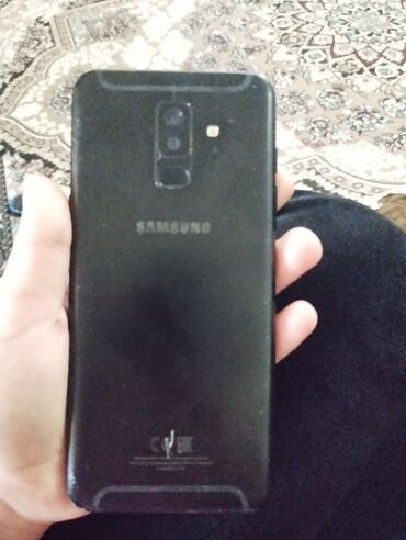 samsung e600: Samsung Galaxy A6 Plus, 32 GB, rəng - Qara, Barmaq izi, İki sim kartlı, Sənədlərlə