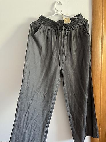 lil solid accessories: Ženske široke pantalone u sivoj boji, laganog i prijatnog materijala — 1